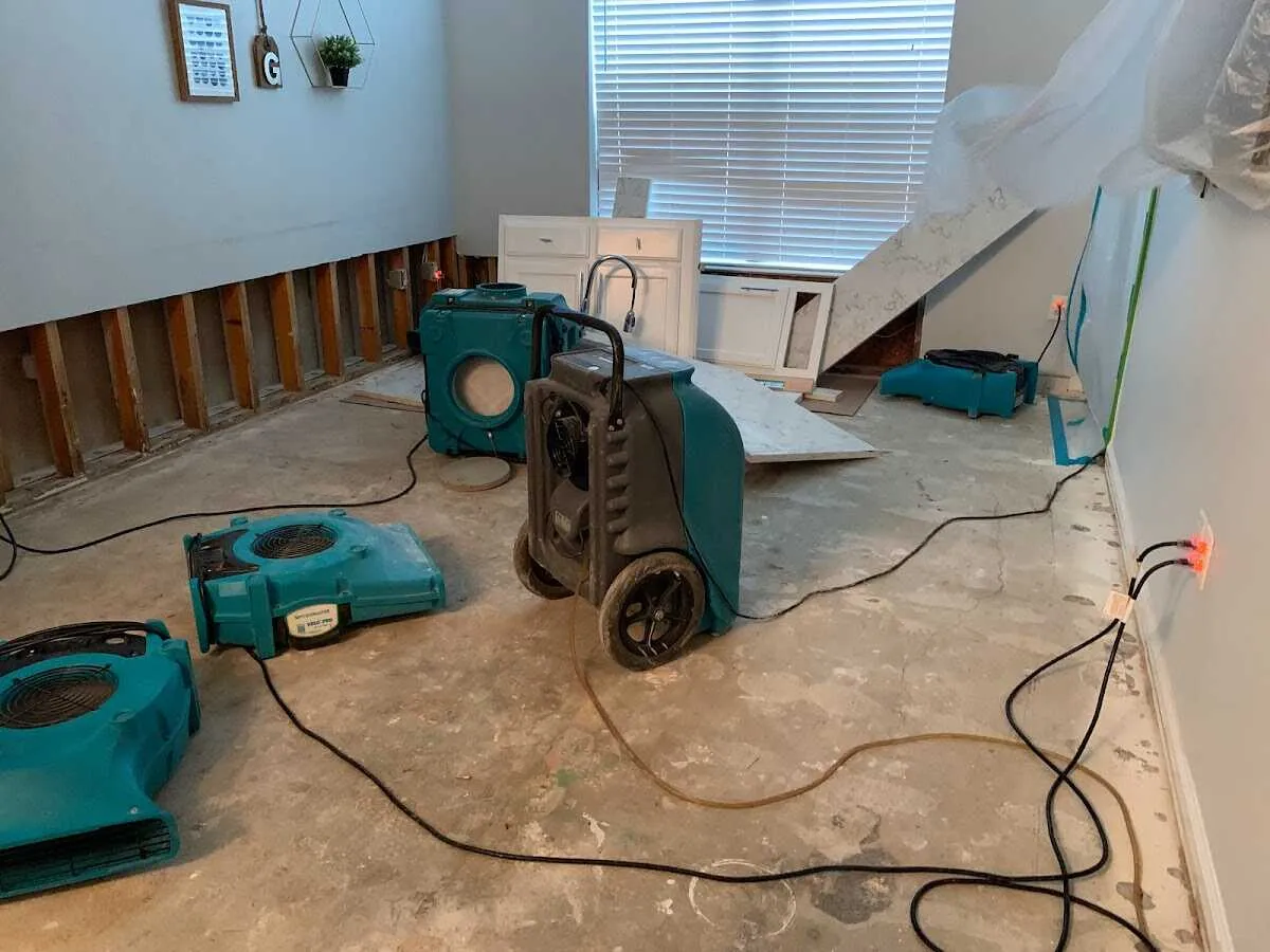 Dehumidifier in flood-cut room for Water Damage Restoration in Westerly