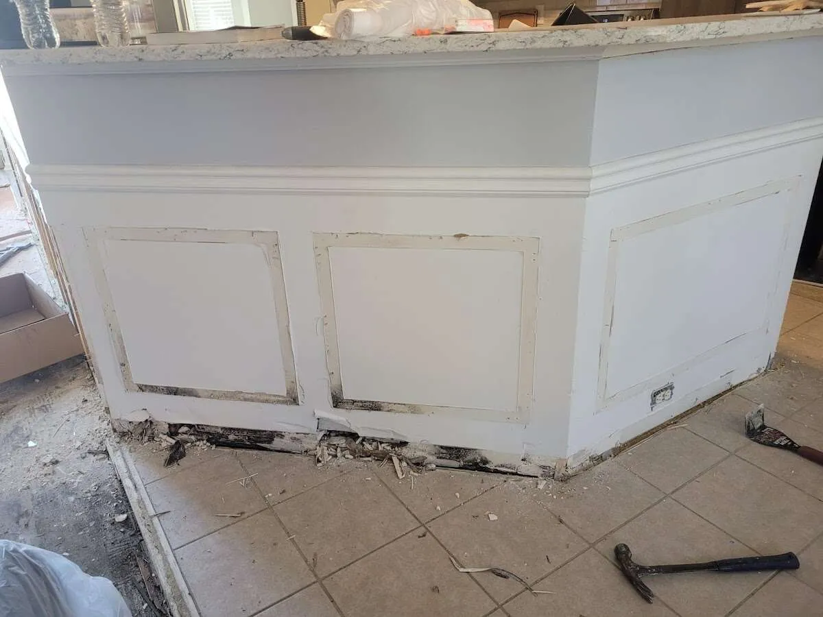 Water damage and mold on kitchen during Storm Damage Restoration in Westerly